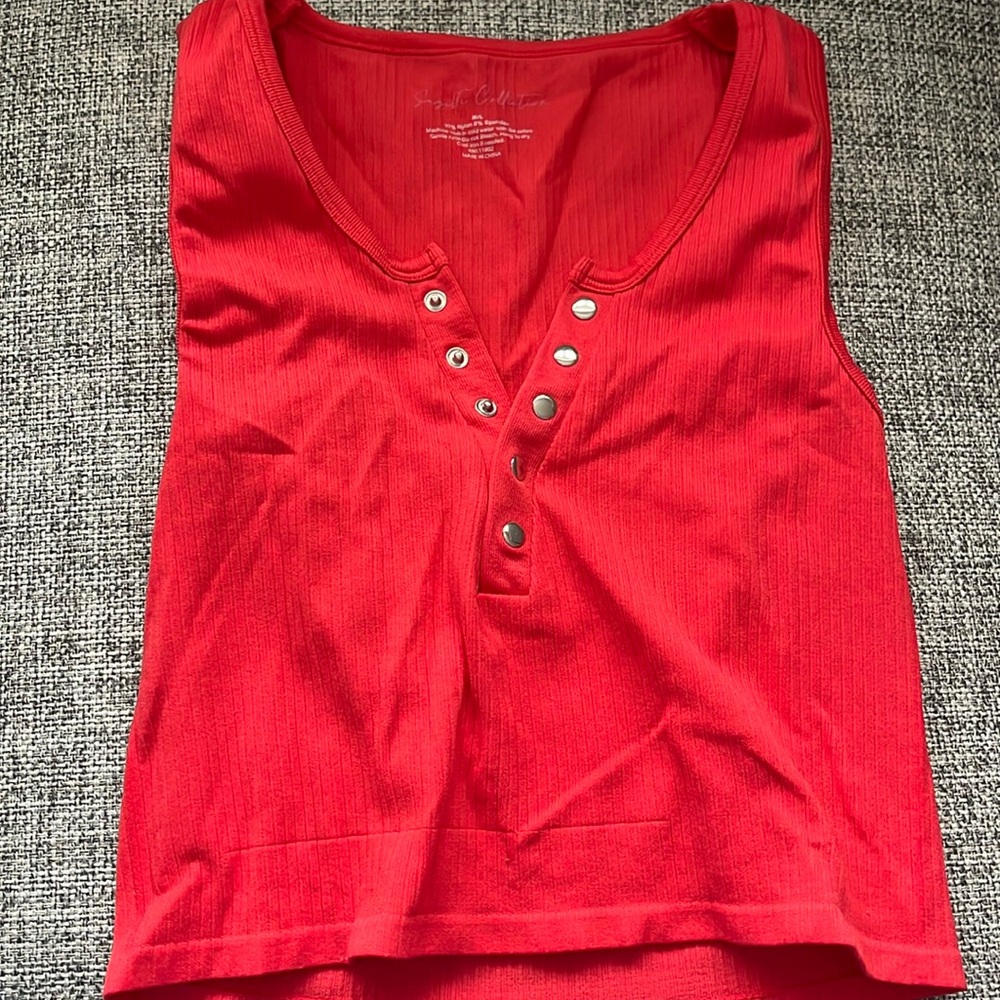 Suzette collection red size m/l tank top. Looks a bit darker in person.